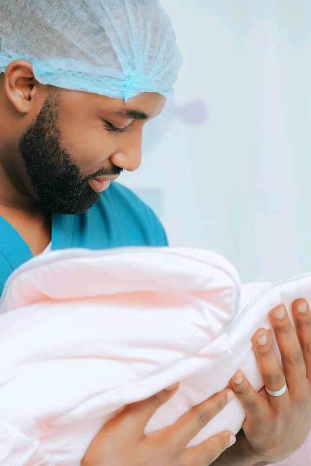Sebumya holding her baby